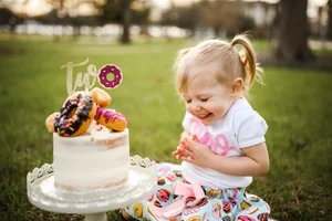 Donut themed two year old outdoor cake smash