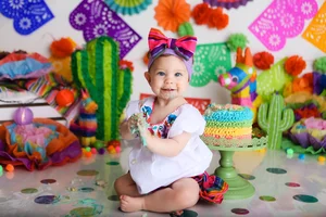 Fiesta themed cake smash with colorful setup