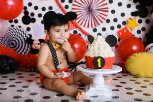 Mickey Mouse themed cake smash birthday session