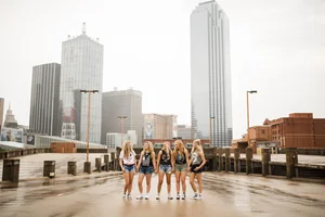 Group senior photo with Dallas urban skyline