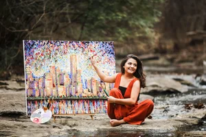 Senior portrait with colorful Dallas art wall