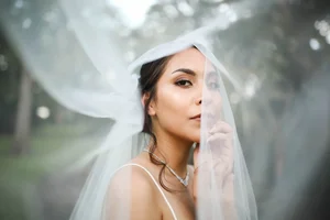 Close up portrait of bride under veil in Weatherford